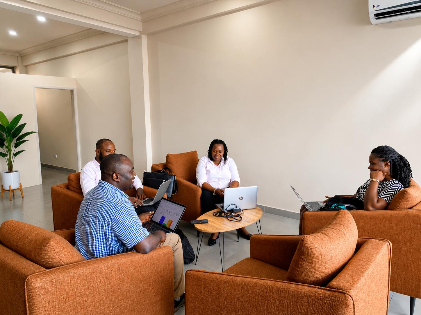 The Corebanc team working together in the Accra office